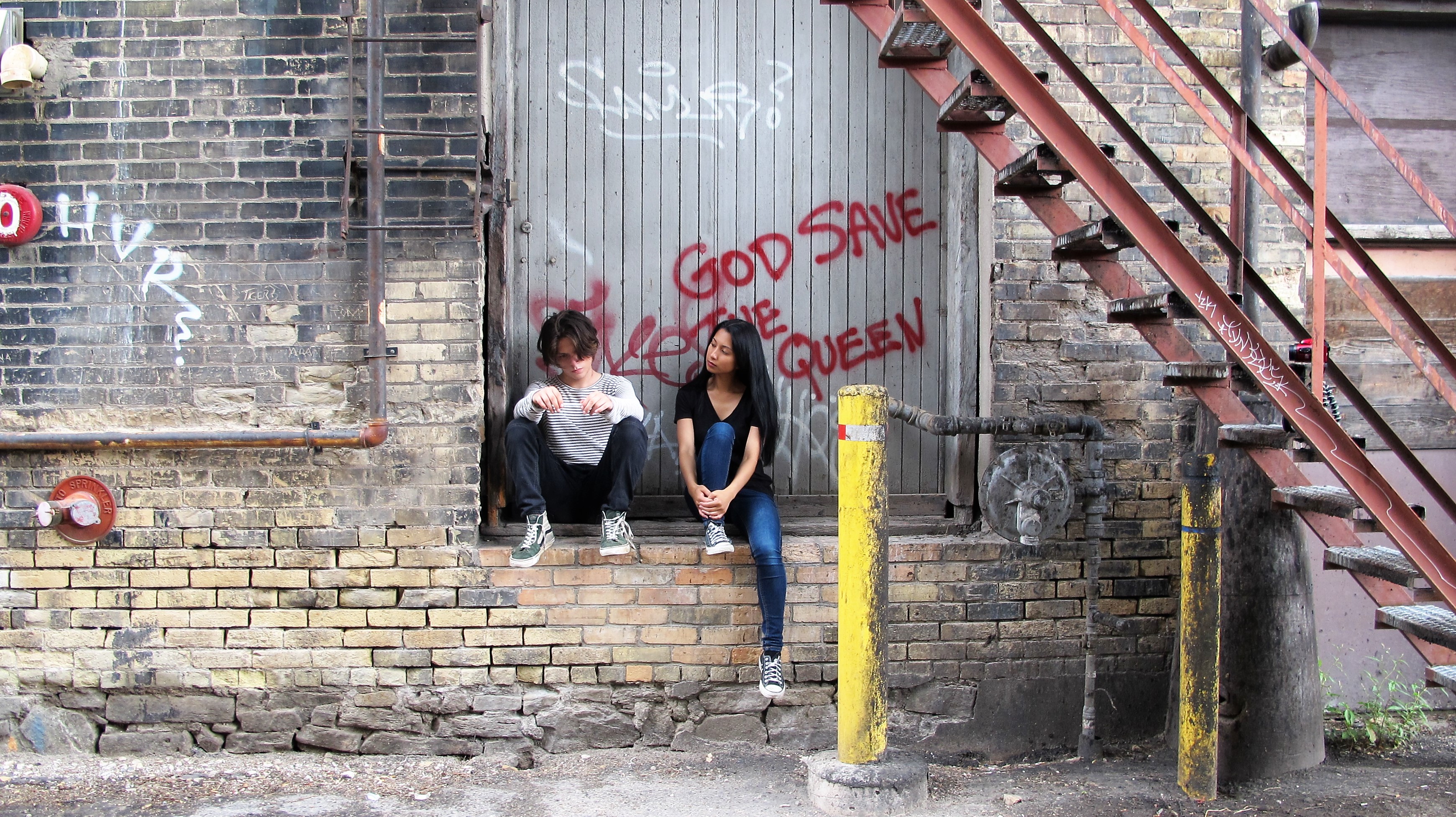 sitting here6 Jamie and Mouse sitting outside the timeless studio